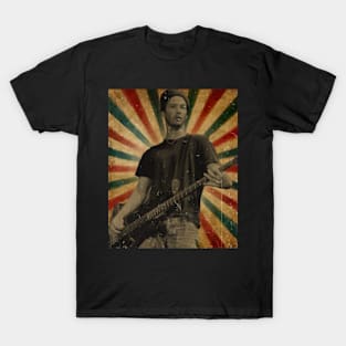 Keanu Reeves playing bass guitar in his band T-Shirt